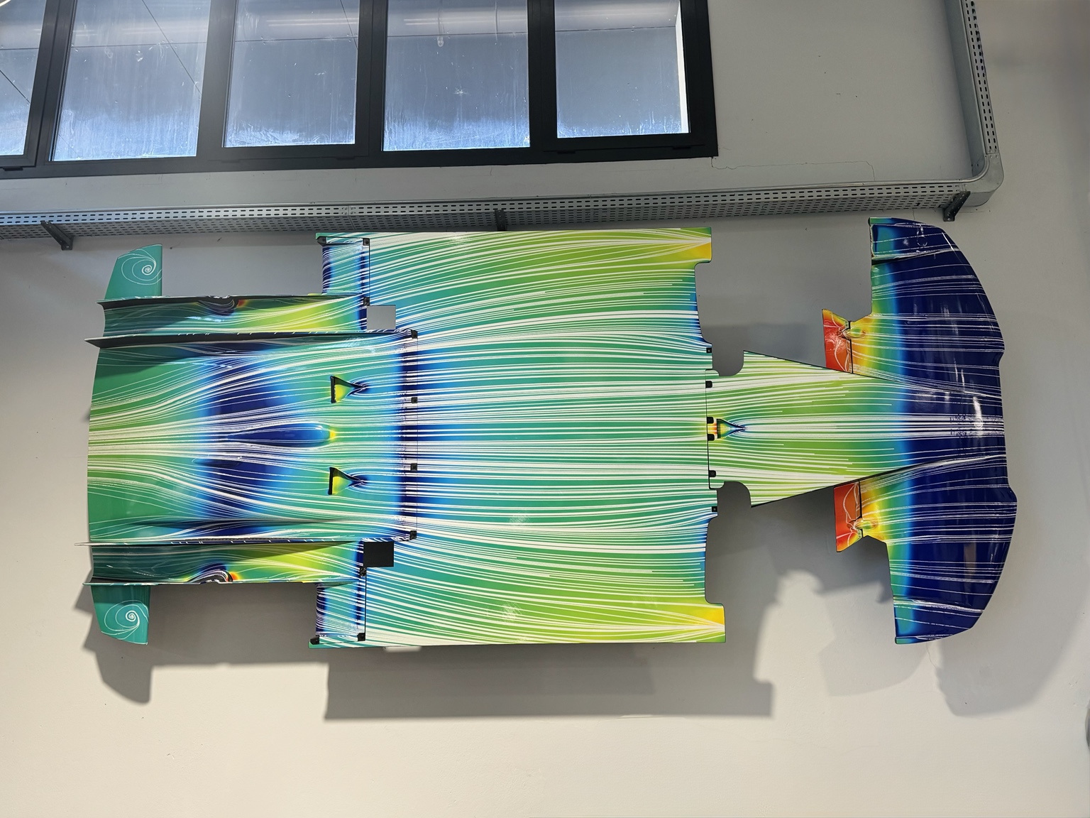 Aerodynamic airflow visualization across a racing chassis