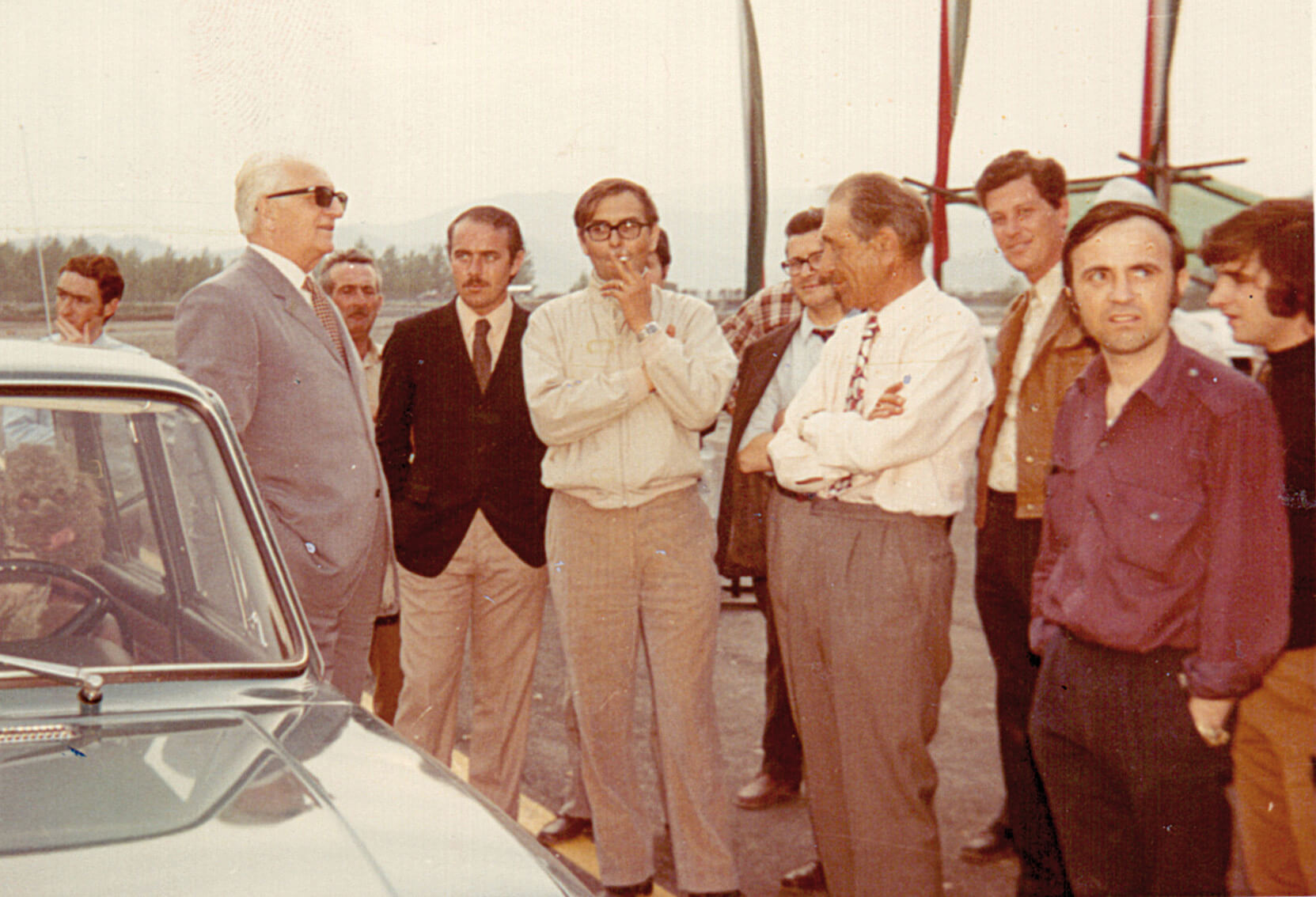 Historical group photograph connected to Dallara's automotive history